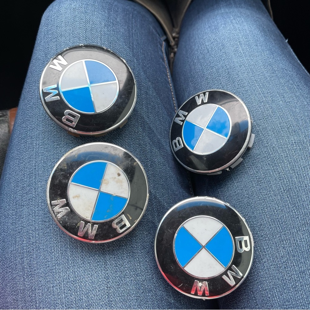 BMW wheel caps two used and two new